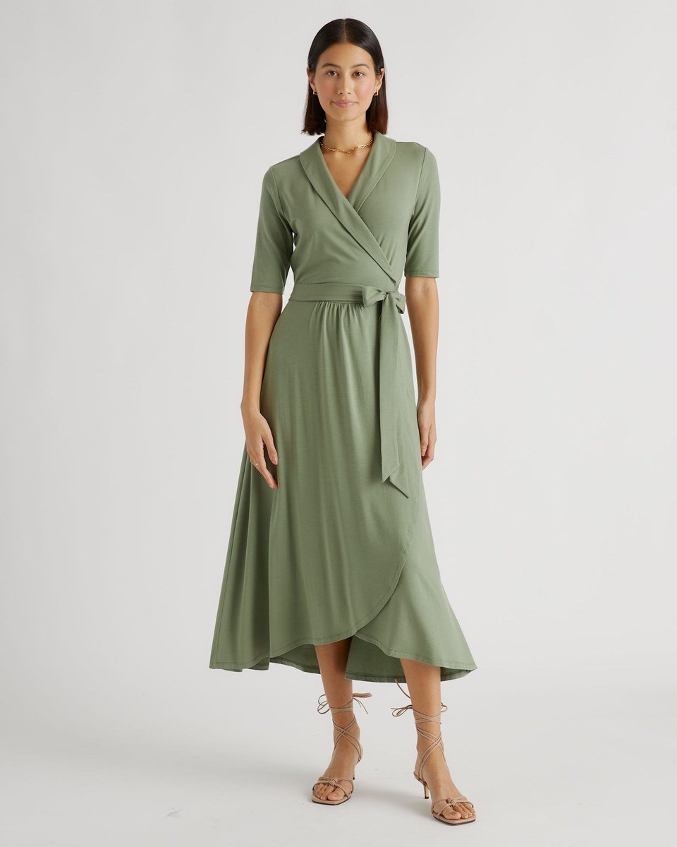 Sage green Tencel wrap dress with elbow sleeves and a tie waist, one of the church outfits for women over 50 in this list.