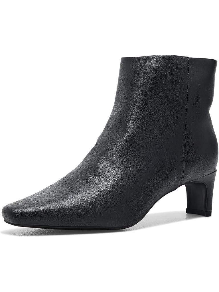 Plain black ankle boot with a low curved heel, an everyday fall boot in medium and wide widths.