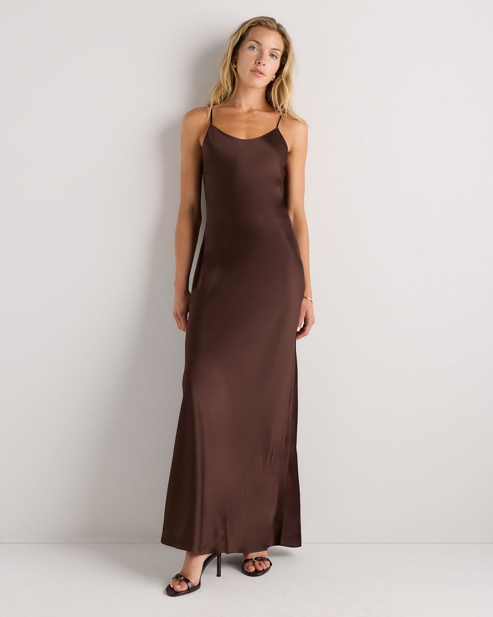 Chocolate brown silk maxi slip dress under a long cardigan, one of the relaxed holiday party outfits for women over 50.
