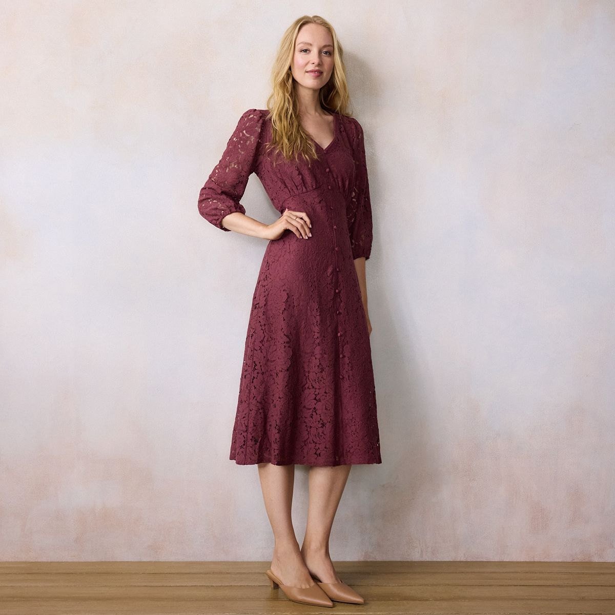 Deep berry lace empire midi dress with three-quarter lace sleeves and a V neck.