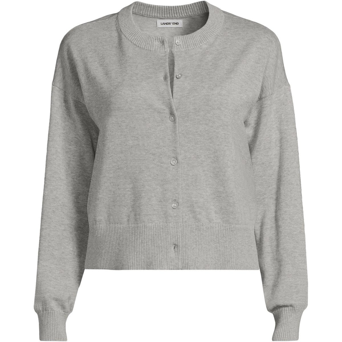 Cropped fine gauge crew neck cardigan buttoned over wide leg pants, a balanced outfit for women over 50.