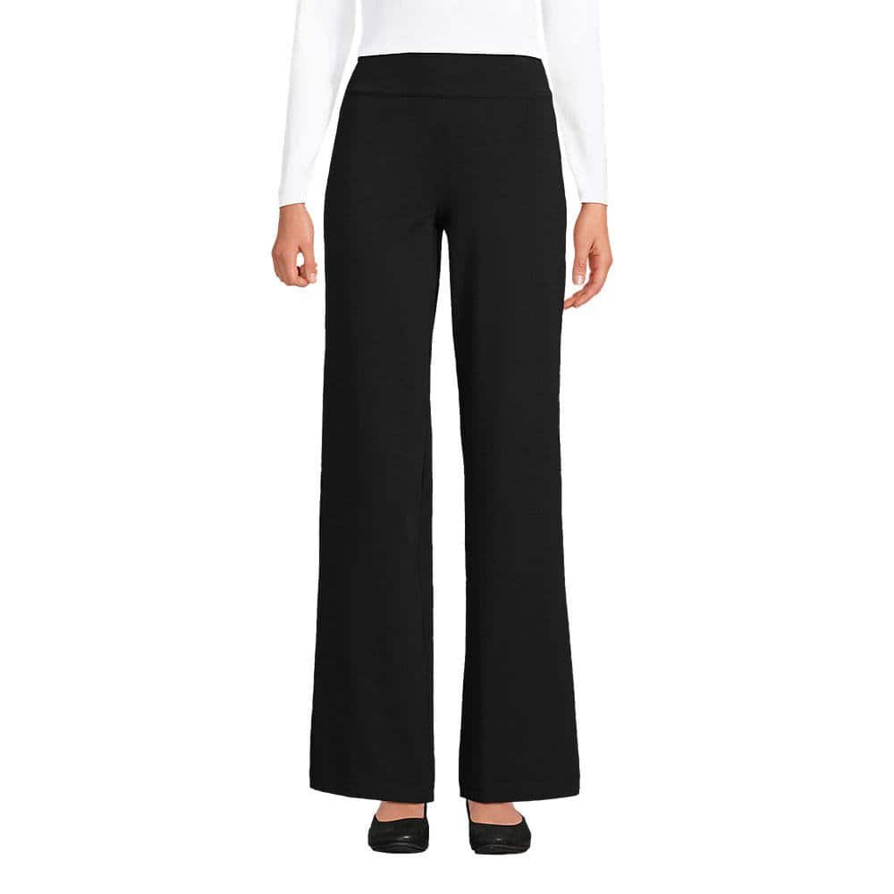 High rise wide leg palazzo pants with a front tucked fitted top, a balanced outfit that flatters a tummy over 50.